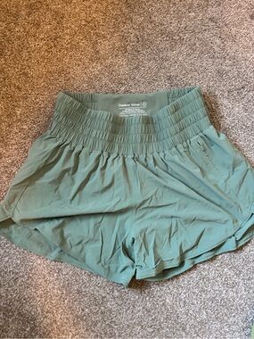 Outdoor Voices Smocked-Waist Sage Green Athletic Shorts